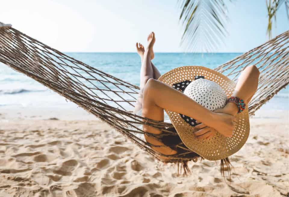 Woman enjoying the perks by going on vacation