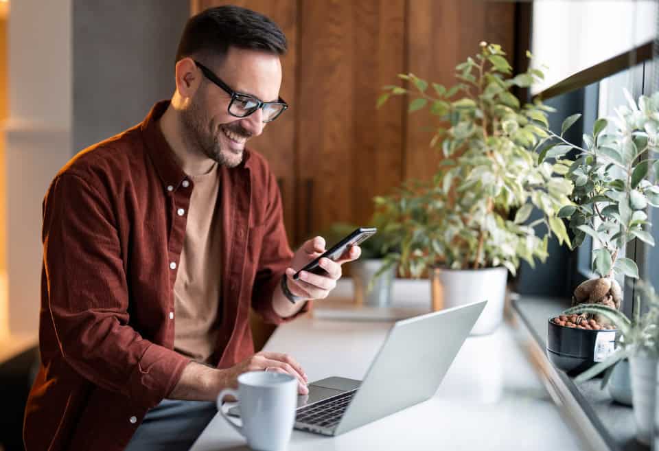 man checking his online banking account