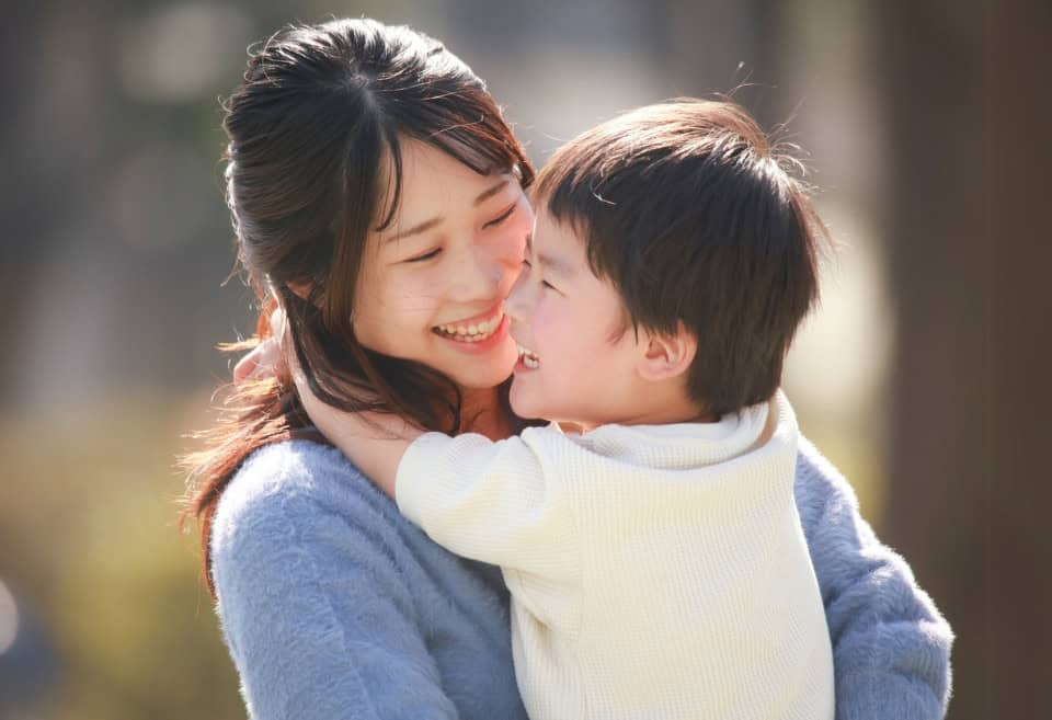 Mom Hugs Son