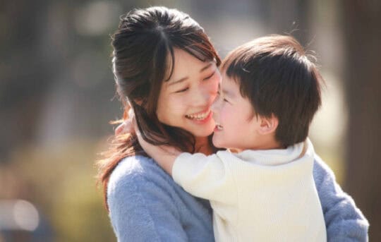 Mom hugs child