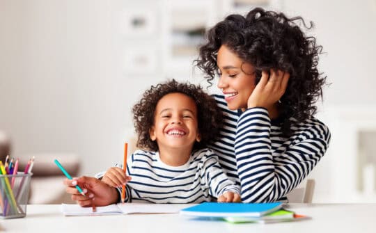 Mother and son read a book