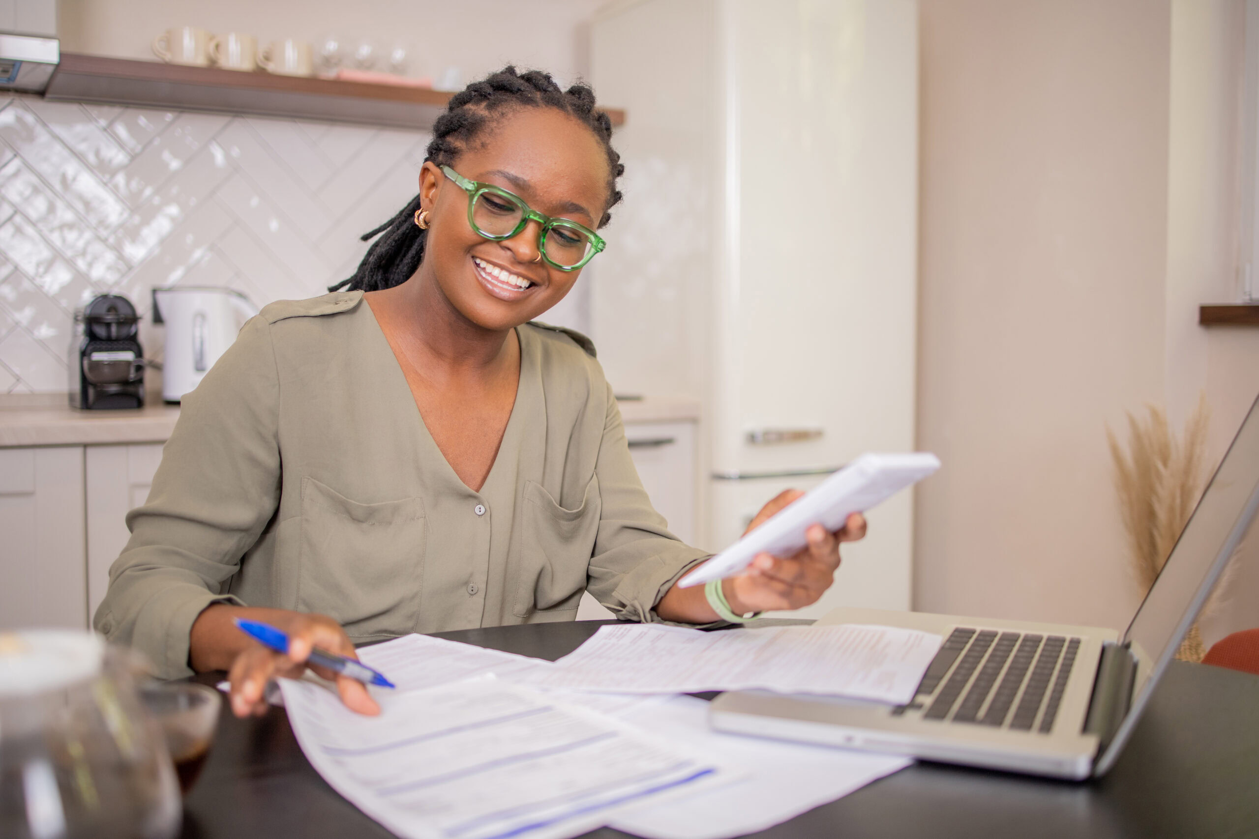 Young woman calculating her retirement goals
